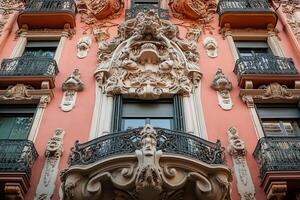 Ornate balcony and window on an old building facade. photo