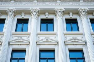 Classic white building facade with columns and windows. photo