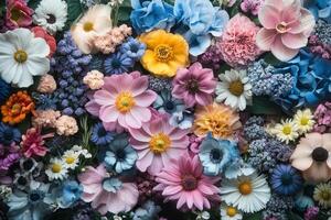 A vibrant tapestry of colorful flowers, blooming in full splendor, forming a beautiful and fragrant background. photo
