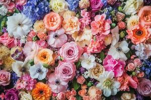 A large arrangement of flowers is shown photo
