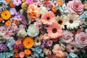 A large variety of flowers are arranged in a large arrangement photo