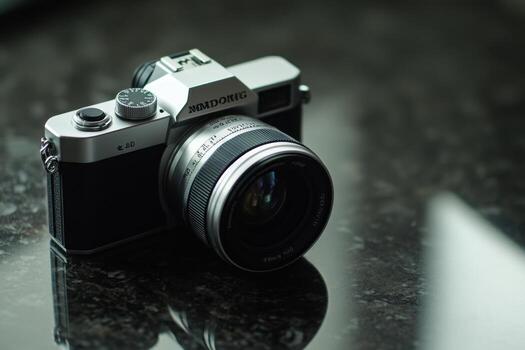 Silver digital camera on a table. photo