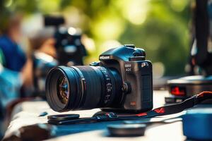 DSLR camera on table with blurry background. photo