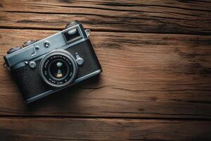 Vintage camera on a wooden table. photo