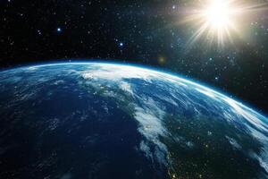 A beautiful view of the Earth from space, showing the sunrise over a blue planet. photo