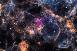 A colorful nebula with a vibrant pink, orange, and blue glow. photo