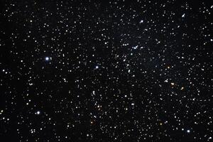 A field of stars in the night sky. photo