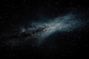 A starry night sky with the Milky Way galaxy visible. photo
