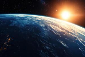 Earth from space with sunrise and stars. photo