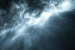 Abstract background of swirling white smoke with a ray of light on a black background. photo