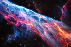 A vibrant nebula of red, blue, and yellow gas stretches across a black starry sky. photo