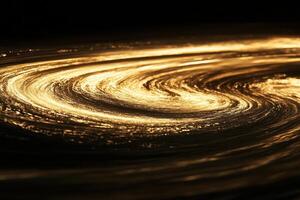 Abstract swirling golden light on black background. photo