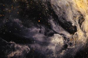 Abstract swirling nebula with golden dust particles on a black background. photo
