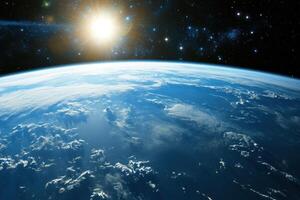 Earthrise with the sun shining over clouds. photo