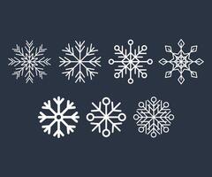 Set of snowflake icons. White snowflakes of different shapes on a dark background. For Christmas and seasonal designs. vector