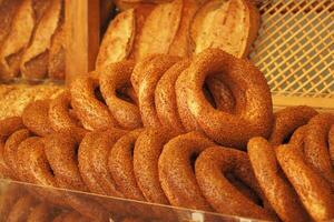 A beautiful array of Traditional Baked Bagels beautifully Displayed in a local Bakery photo
