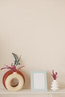 Explore Stylish, Minimalist Decor Featuring Vases and a Beautiful Picture Frame Display photo