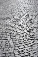 Textured Cobbled Streets that Effortlessly Showcase a Worn and Distinctive Aesthetic Appeal photo