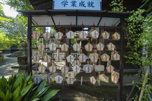 A votive tablet at Nanasha shrine in Tokyo photo