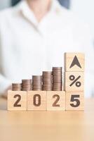 2025 New year with percentage change to UP and Down arrow with coin stack. Interest rate, GDP, stocks market, financial, deflation and Inflation, mortgage, debt, Loan and Economic Recession photo