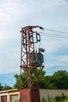 Medium voltage power tower and transformer substation. Used by small consumers and small industry. photo