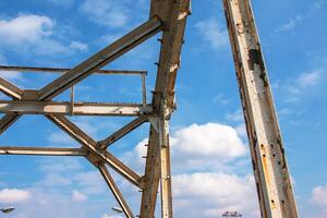 Structural elements of the old pedestrian bridge built in the USSR across the Dnieper River. photo