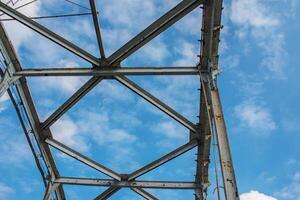 Structural elements of the old pedestrian bridge built in the USSR across the Dnieper River. photo