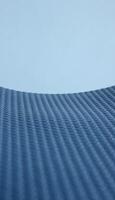 Pattern of rows of small circles on blue elastic insulation material stock photo for vertical abstract surface backgrounds