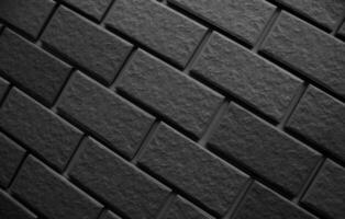 Beveled lines of evenly laid slabs in the form of brickwork. Monochrome stock photo for house renovation backgrounds