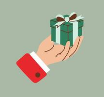 Hand holding a small green gift box with a ribbon and bow, featuring a red sleeve. Minimalist flat style illustration, ideal for festive and holiday-themed projects, gift-giving designs, promotions. vector