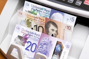 Scottish pound in the counting machine photo