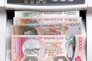 Mauritian rupee in the counting machine photo