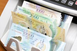 Vanuatu vatu in the counting machine photo