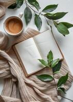 Coffee Cup and Book on Bed photo