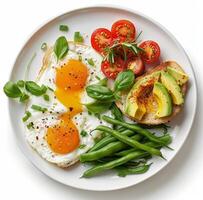 White Plate With Eggs, Green Beans, and Tomatoes photo