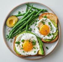White Plate With Eggs, Green Beans, and Tomatoes photo