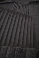 Staircase pattern with concrete steps provide a striking and textured background that is perfect for various design projects, presentations and artistic creations a perfect background. photo