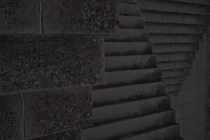 Staircase pattern with concrete steps provide a striking and textured background that is perfect for various design projects, presentations and artistic creations a perfect background. photo