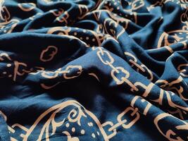 texture and background of blue cloth with a chain pattern photo