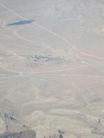 Airplane view. Mojave Desert. Small towns, roads and fields. Scenic view from above on the ground photo