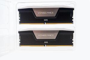December 2023, Tallinn, Estonia. Corsair. Two high-performance black and silver computer memory modules are isolated on a clean white background. The modules are labeled with Vengeance DDR5, showcasing their advanced technology and design. photo