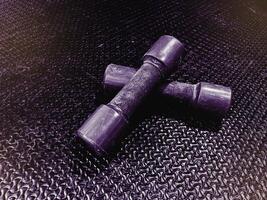The abstract art design background of Dumbbell,sport training tools,dramatic tone, photo