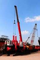 Concrete piling machine Hydraulic Static Pile Driver HSPD at construction site photo