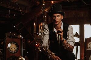 man in a steampunk suit with a top hat and a cane photo