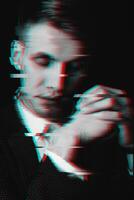 Black and white portrait of a man with glitch effect photo