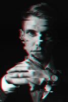 Black and white portrait of a man with glitch effect photo