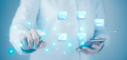 Hand pushing a button on a touch screen interface. Cloud computing, technology connectivity , working with a virtual screen computing diagram in business,ICT Information communication internet concept photo