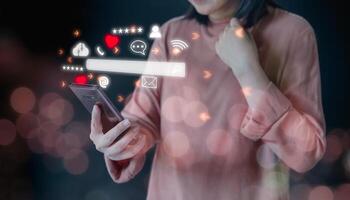 Business woman use mobile phone streaming virtual business network, text message, process diagram. Staying connected. Smartphone with icon social media and social network everyday technology usage. photo