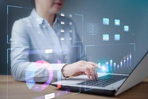Financial Data analyst working on business Analytics and Data Management System on computer, report KPI and metrics connected to database. Corporate strategy for finance, operations, sales, marketing. photo