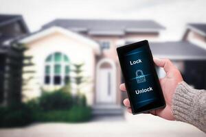 Home security and anti theft technology that connects to your smartphone with an application , Home security and anti theft technology concept photo